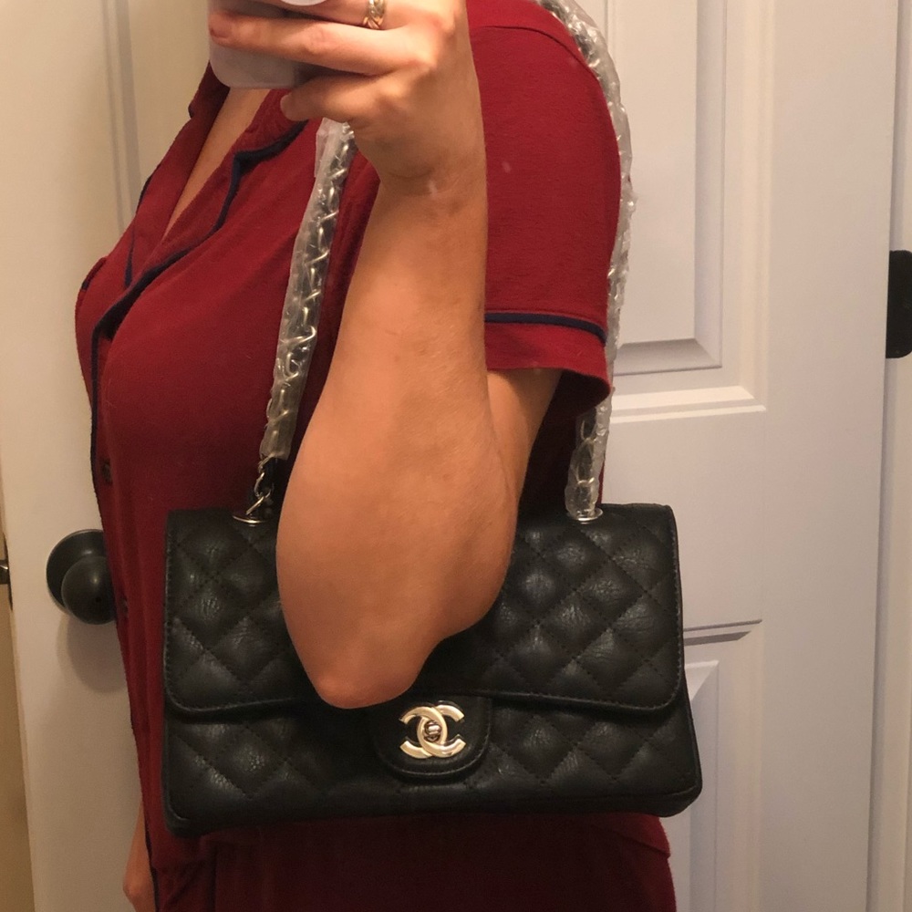 Not authentic C & C black quilt handbag.